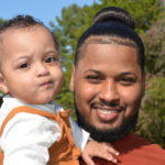 Man holding baby